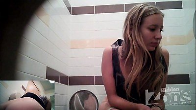 Blonde. Fishnet stockings, undies and a tiny sadomasochism fuckbox