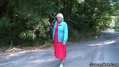 elder blonde hitchhiker doggy-fucked outside
